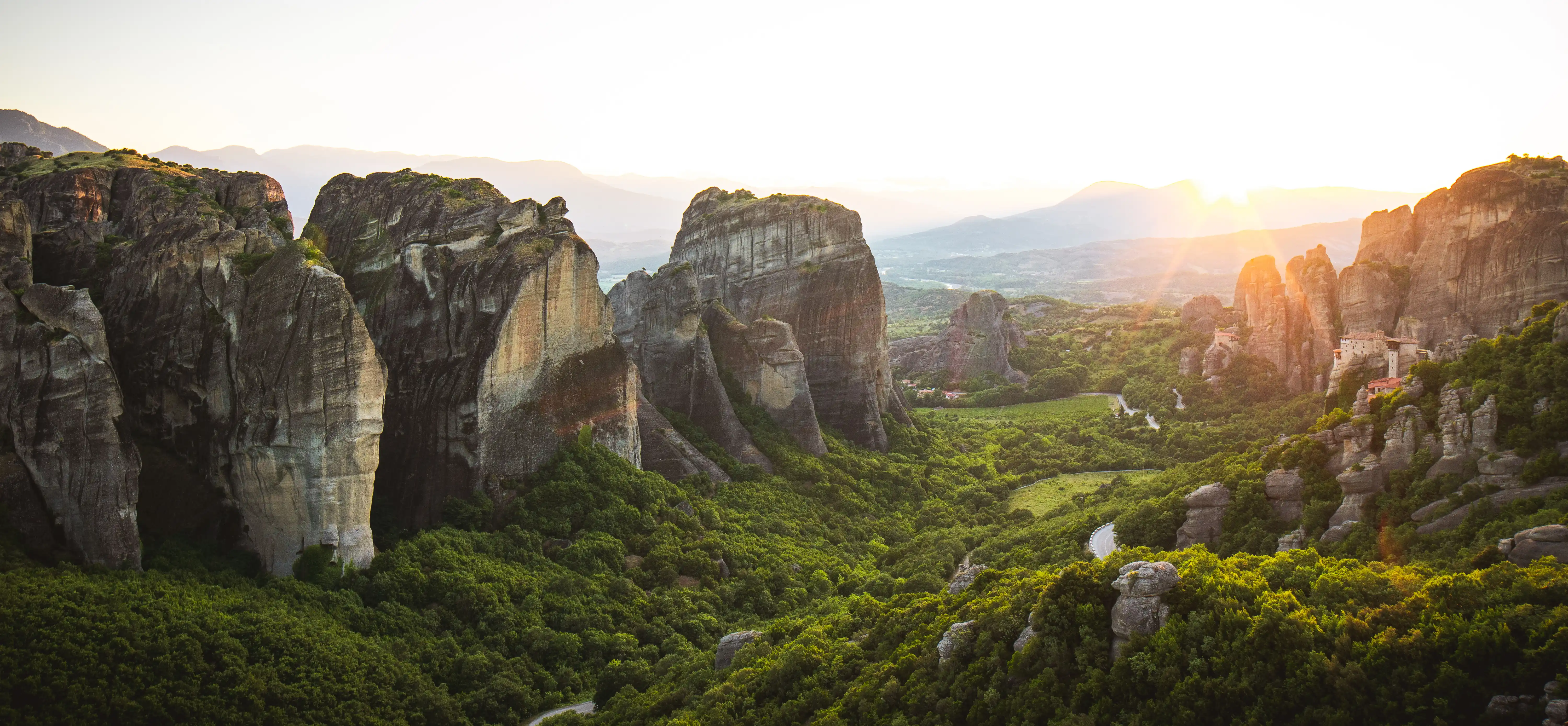 Meteora rock formations with ancient monastery perched on the summit