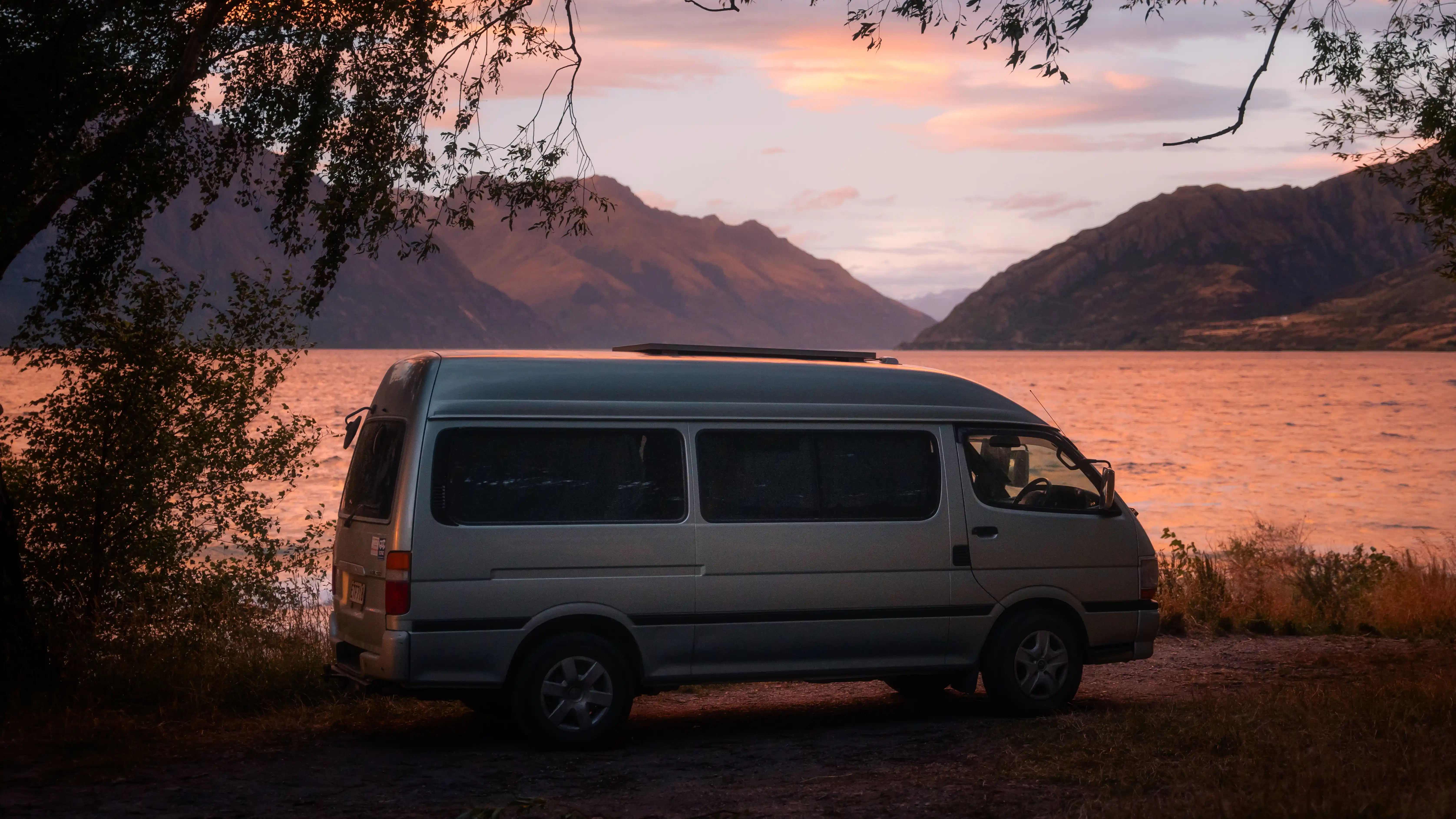 Campervan at Kingston Freedom Camping site on the shores of Lake Wakatipu