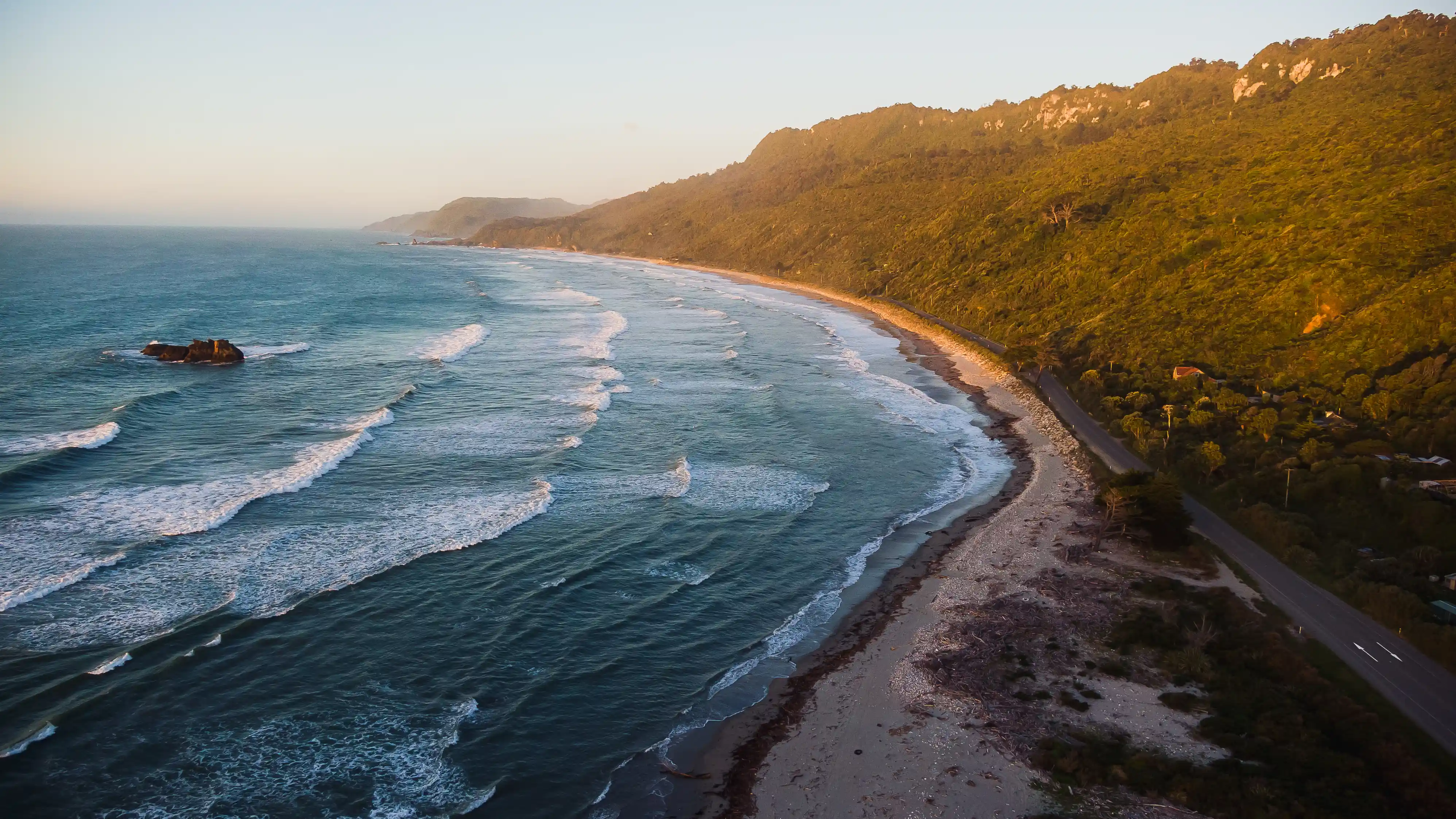Aerial view of Fox River and winding coastal roads on New Zealand West Coast