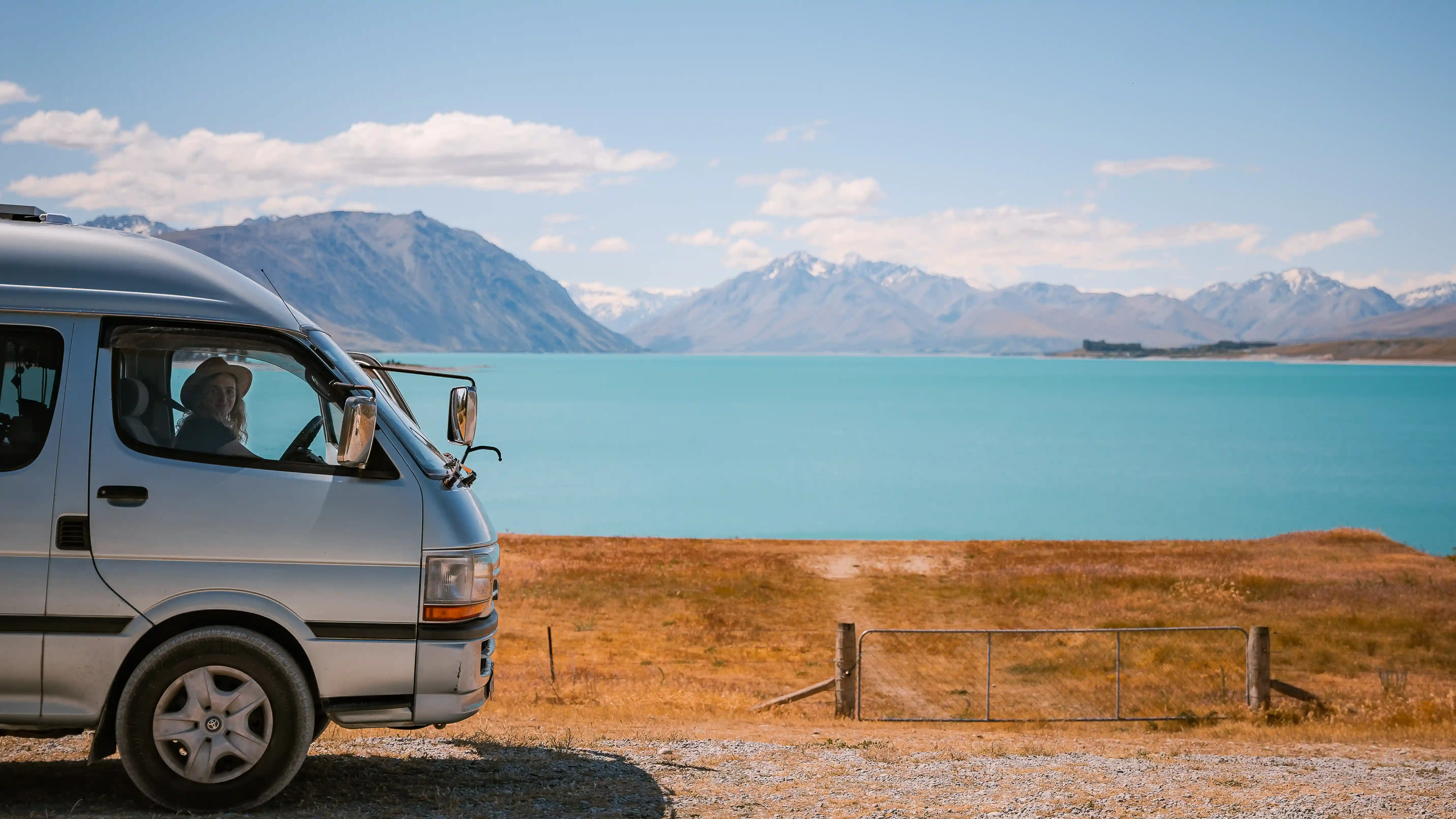 Toyota HiAce campervan next to Lake Ohau New Zealand