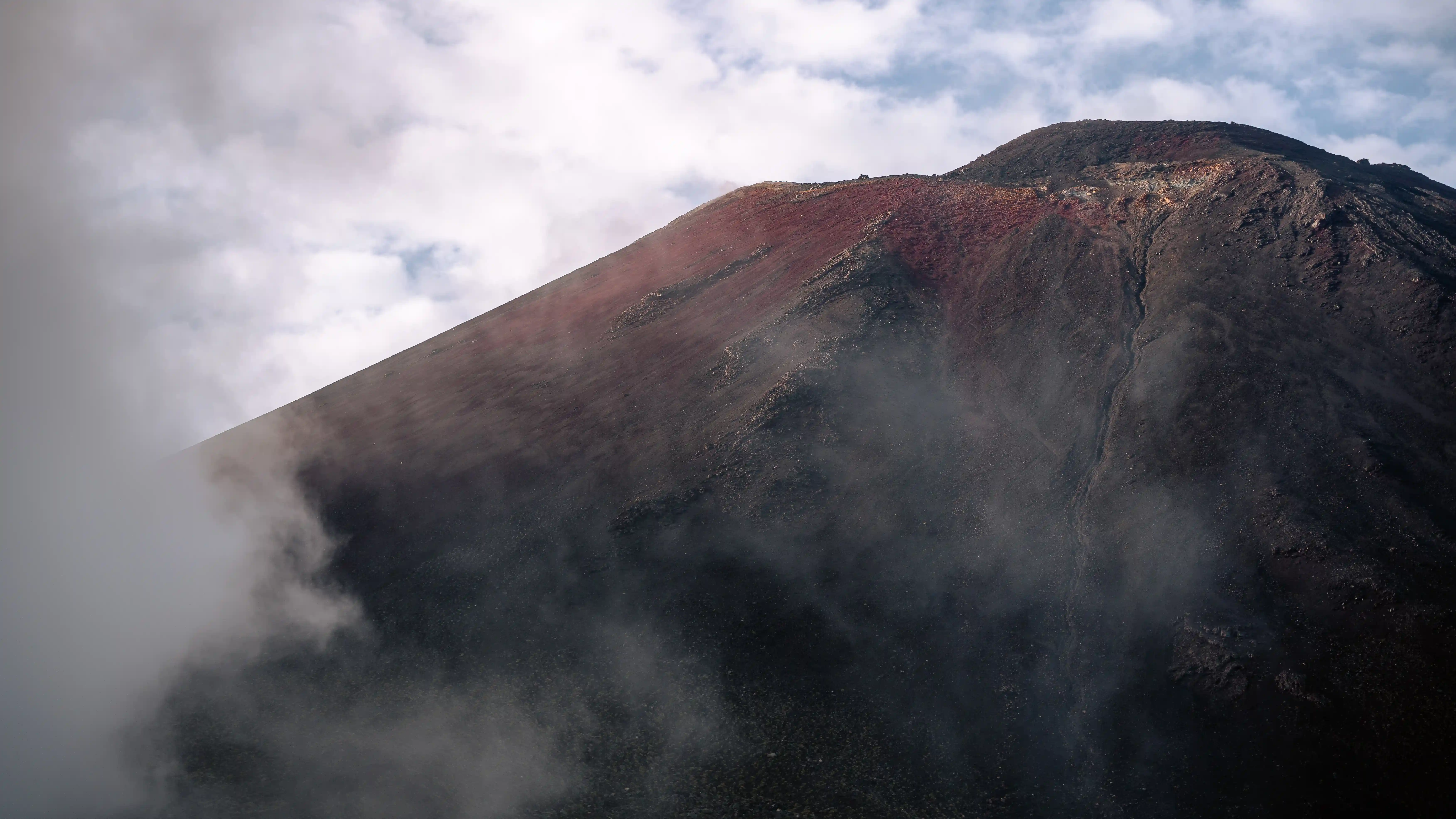 Fog rolling in on Mount Ngauruhoe from the top of the Devil's Staircase